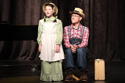 Scott Mulherin, right, performs the Anne of Green Gables song “Gee I’m Glad” with daughter Madison.